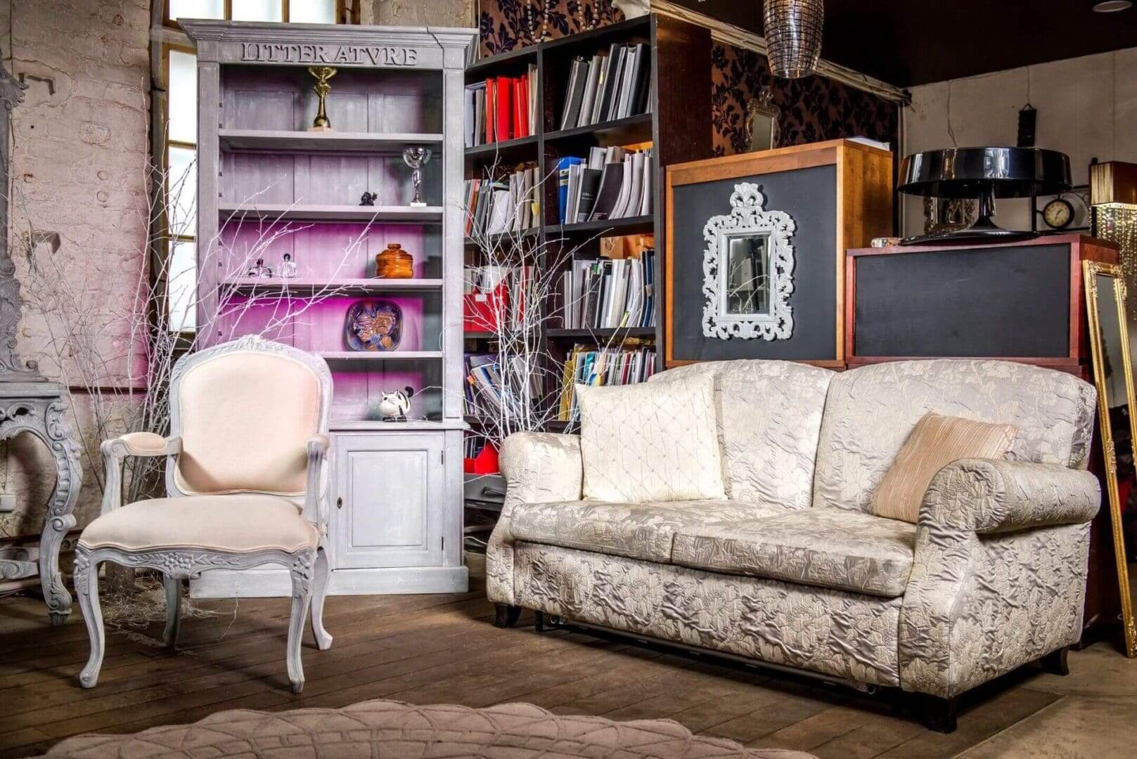 A living room with a couch and chair