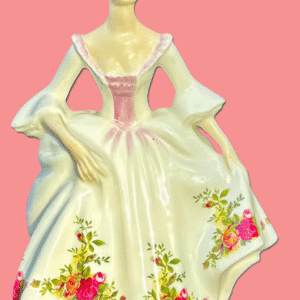 A porcelain figurine of a woman in a floral dress with puffed sleeves.