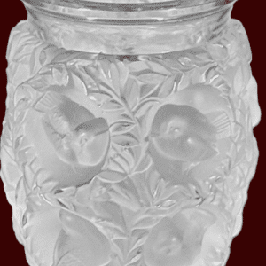 Intricately carved frosted glass vase with floral and butterfly designs.