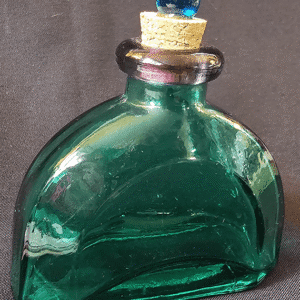 Green glass bottle with a cork stopper and curved design.