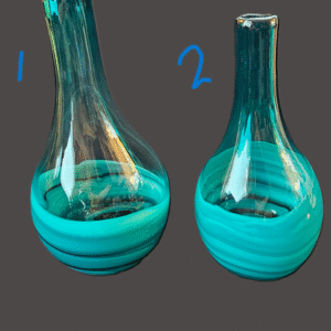 Two glass vases with blue swirled designs labeled 1 and 2.