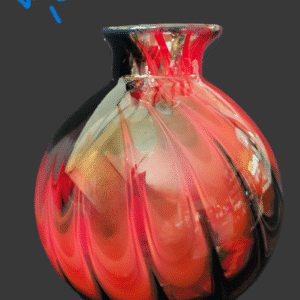 A colorful glass vase with red and orange swirls.