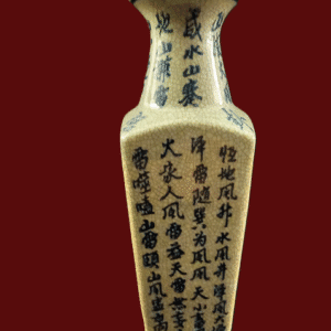 Ancient Chinese bronze dagger with inscriptions on blade and handle.