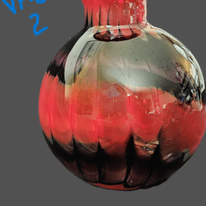 Round glass vase with red and black abstract design.