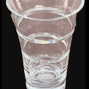 A clear plastic cup filled with water.