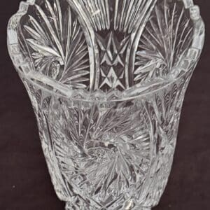 Intricately cut crystal glass with detailed patterns.