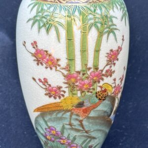 Elegant vase with bamboo and cherry blossom painting.